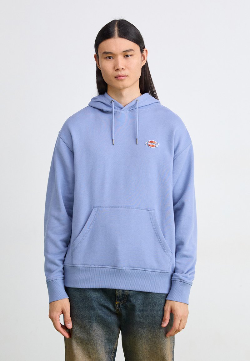 Light blue hoodie made of soft fabric, featuring a front pocket, adjustable drawstring hood, and a small logo on the chest.