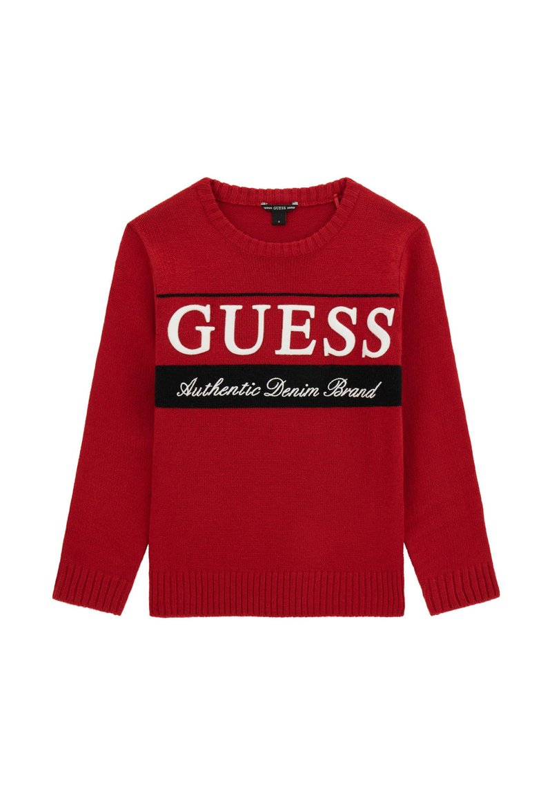 Punane kudumiskampsun ümmarguse kaelusega, millel on suur valge "GUESS" logo ja must accentriba, millel on kirjas "Authentic Denim Brand."