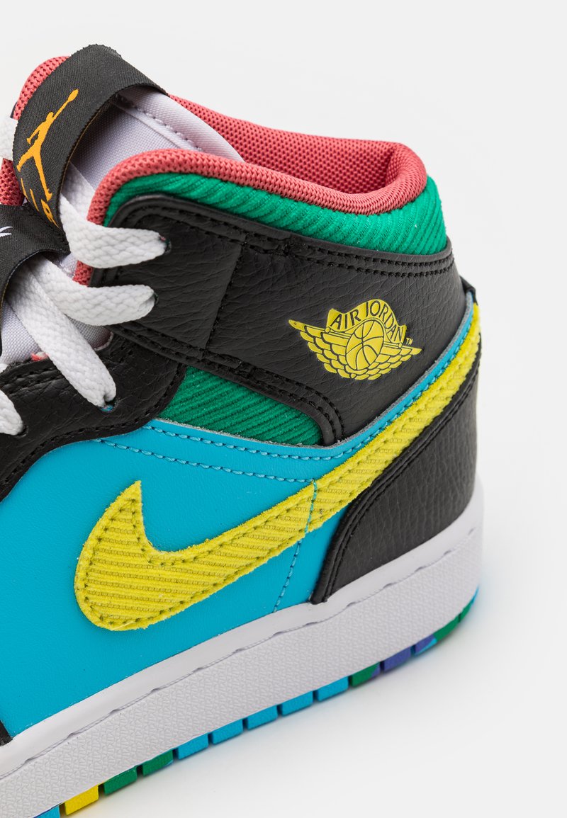 black green yellow and red jordans