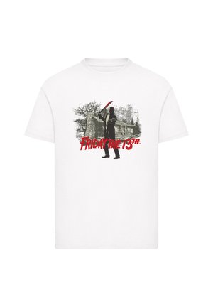 White cotton t-shirt featuring a black graphic of a figure wielding a weapon, with a cabin and trees, and "FRIDAY THE 13TH" in red text.