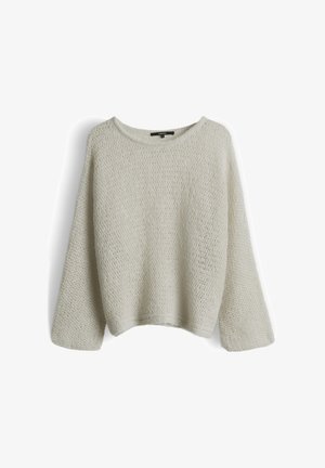 Cream-colored loose knit sweater with wide long sleeves and round neckline hanging against white background.