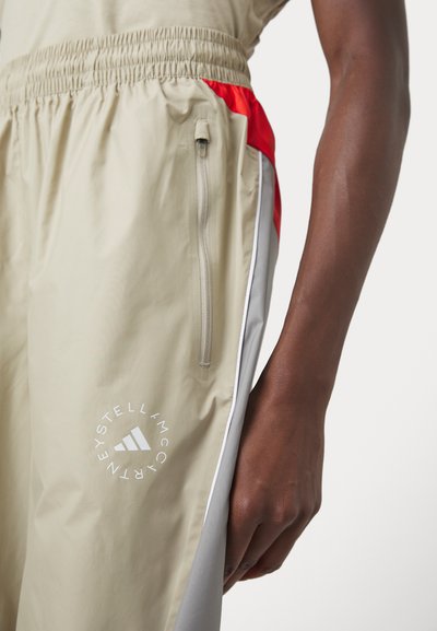 adidas by Stella McCartney PANT - Teplákové kalhoty - desert sand/active red