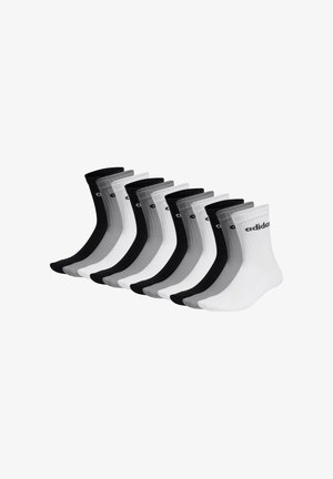 Conjunto de 12 calcetines de tripulación en negro, blanco y tonos de gris. Textura acanalada con logo en cada calcetín. Largo estándar, diseñado para la comodidad.