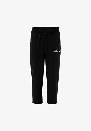 Sorte sportbukser med elastisk talje, sidelommer med lynlås og hvidt "uhlsport" logo på det øverste højre ben.