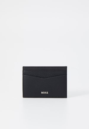 Black leather cardholder featuring multiple card slots, textured surface, and a silver "BOSS" logo on the front. Compact and minimalist design.