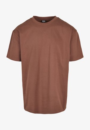 Hnedé bavlnené tričko s okrúhlym výstrihom, krátkymi rukávmi a voľným strihom. Hladká textúra, bez viditeľných vzorov alebo akcentov.