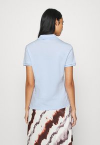 Lacoste Polotričko - ruisseau