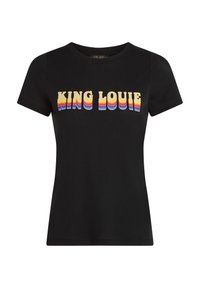 Camiseta de algodón negra con mangas cortas que presenta el texto multicolor "KING LOUIE" en una fuente retro en el pecho. Textura suave, ajuste clásico.