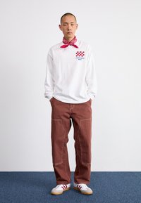 Carhartt WIP MIDLAND DOUBLE KNEE PANT - Traperice opuštenog kroja - offroad rinsed