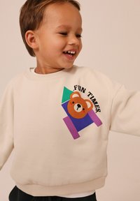 Next BACKPRINT AND JOGGERS SET - Trening - ecru animals