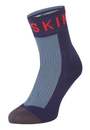 Crew-length sock in navy and light blue with reinforced toe and red lettering "SKIN" at the cuff.