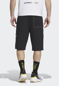 adidas Performance MEN NATIONAL GEOGRAPHIC SHORTS - Shorts - black