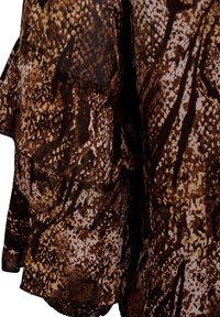 Brown and tan patterned fabric featuring layered ruffles with a textured design resembling snake skin. Soft, flowing material.