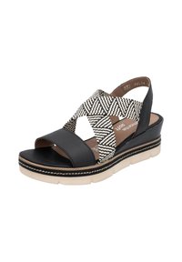 Black leather wedge sandal with a woven black-and-white chevron strap, cushioned footbed, and a textured white sole with stitching detail.
