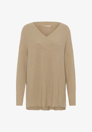 Beige pletený svetr s hlubokým véčkovým výstřihem, ribbovanou texturou a spadlými rameny; má uvolněný střih a boční rozparky na spodním lemu.