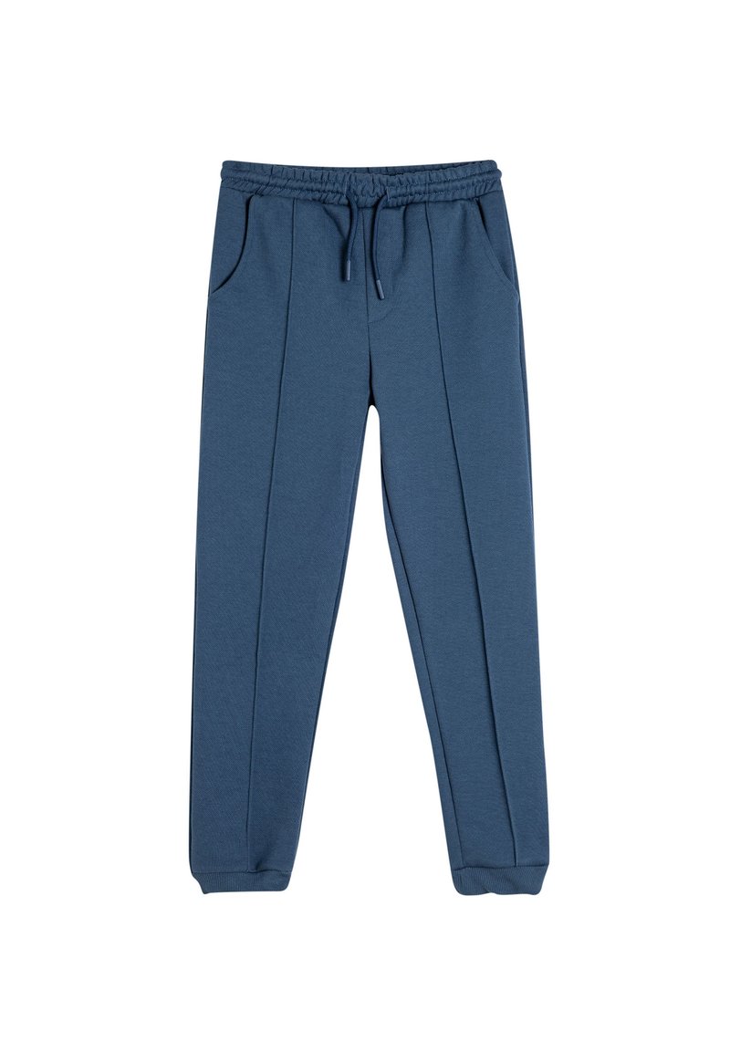Joggingbukser i en bomuldsblanding i blå, med elastisk talje, snøre, to sidelommer og ribbede ankler.