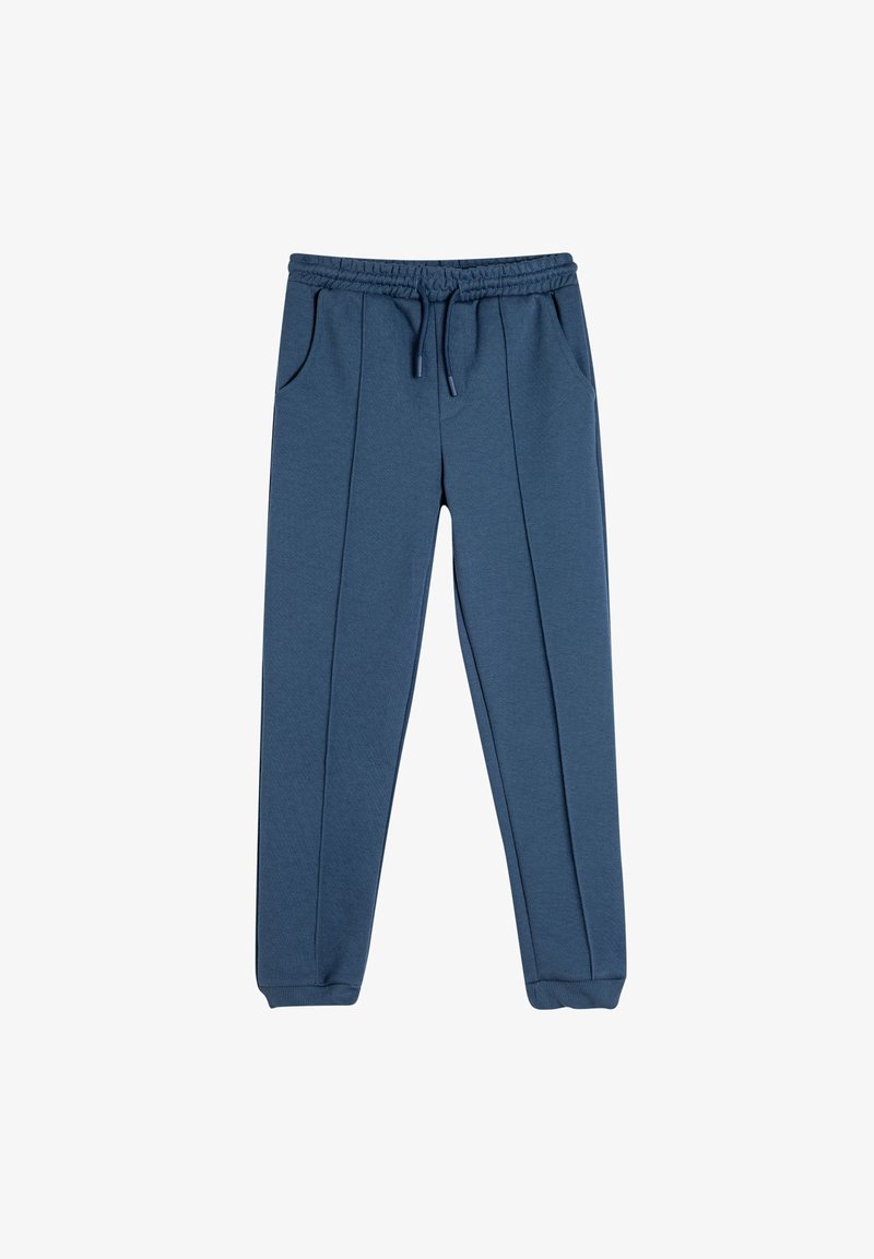 Joggingbukser i en bomuldsblanding i blå, med elastisk talje, snøre, to sidelommer og ribbede ankler.