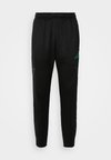 HOUSE OF TIRO NATIONS PACK - Tracksuit bottoms - black/collegiate green/blanch green