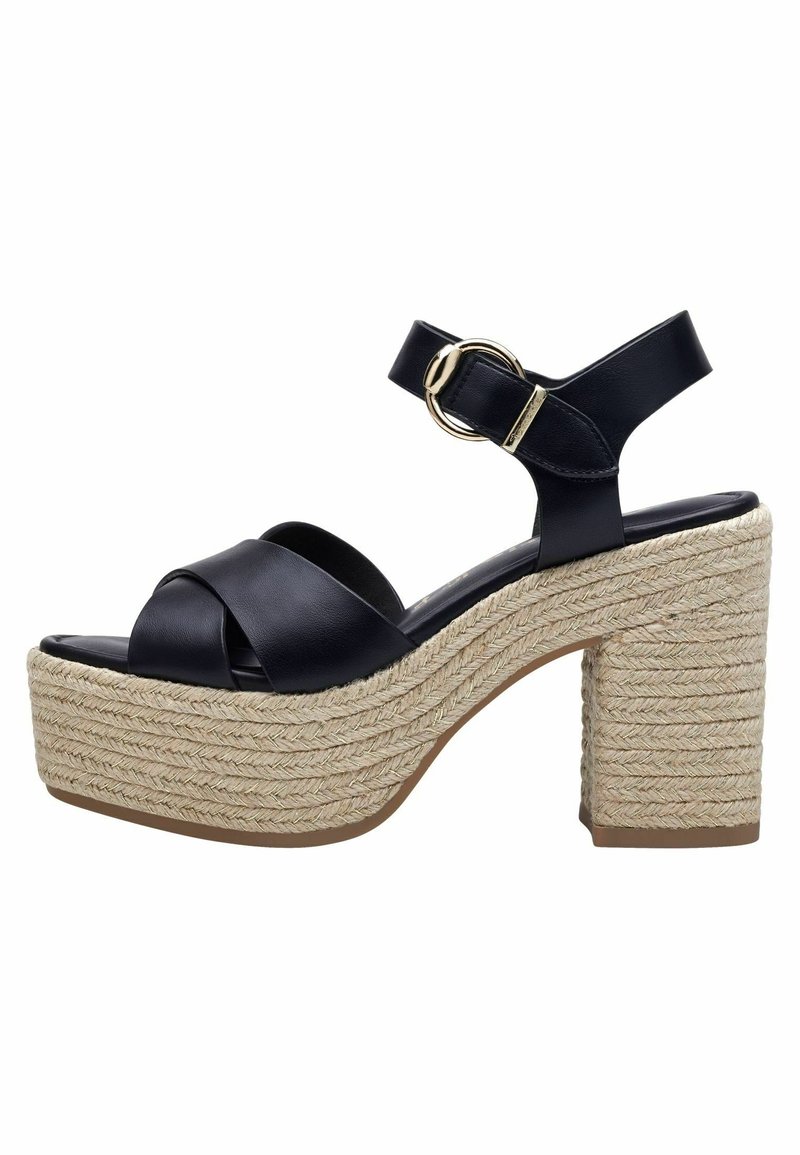 Sandale plateforme en cuir noir avec talon bloc en jute tressée et bride de cheville avec boucle circulaire dorée.