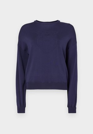 Felpa cropped blu navy realizzata in tessuto morbido con scollatura rotonda e maniche lunghe. Presenta un design in rilievo sulla parte anteriore.