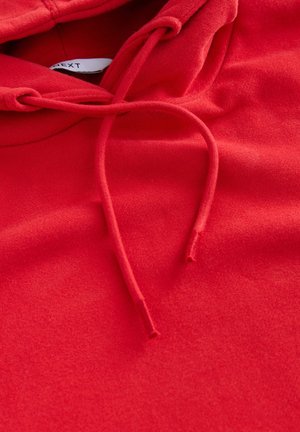 Rode hoodie met een zachte textuur, voorzien van een trekkoord en subtiele naden, met een casual ontwerp en effen kleur.