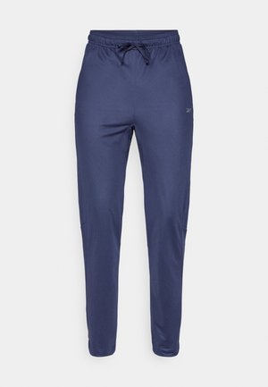 Jūras spēku sporta bikses ar šauru piegriezumu, elastīgu jostasvietu, aukliņu un sānu kabatām. Izgatavotas no gludas, elastīgas auduma.