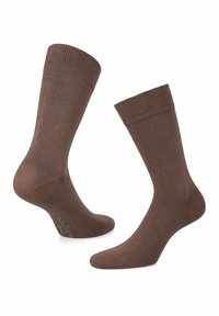 Brązowe skarpetki wykonane z miękkiego, elastycznego materiału, z kancelem o prążkowanej fakturze i gładką powierzchnią, bez widocznych wzorów czy akcentów.