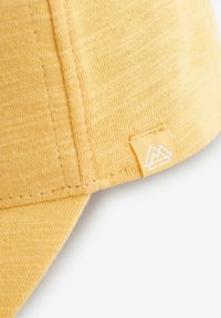 Next Caps - yellow