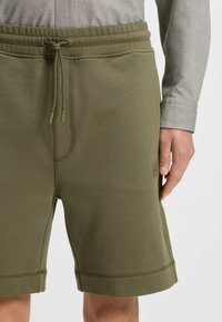 BOSS SEWALK - Jogginghose - open green two