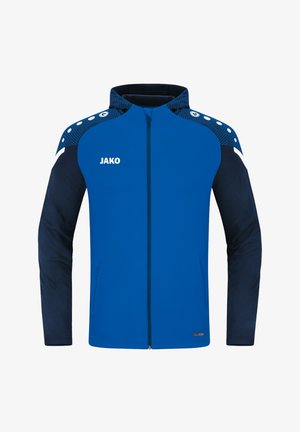 Blaues Sportjackett mit marineblauem Grund, verfügt über einen Reißverschluss, strukturierte Schultern und weiße Akzente mit "JAKO"-Branding.