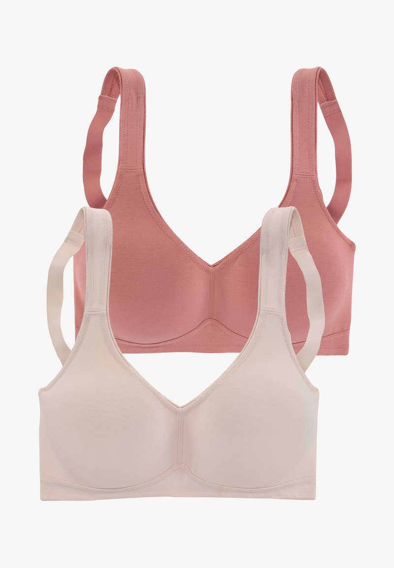 Två behåar i rosa och beige, tillverkade av mjukt tyg. De har breda axelband, en V-ringad design och en slät, sömlös konstruktion.