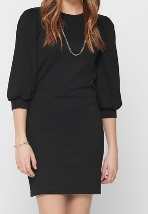 Stickad klänning - black