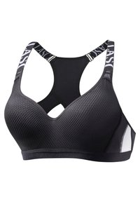 Sujetador deportivo negro con tela texturizada, diseño de espalda nadadora y acento blanco en contraste. Presenta tirantes ajustables y copas sin costuras.