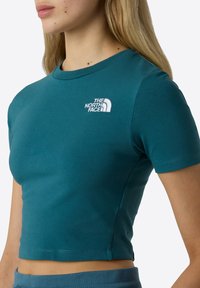 The North Face W ESSENTIAL CROPPED SLIM SHORT SLEEVE TE - T-Shirt print - space