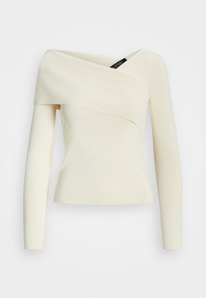 Stickad tröja - off-white