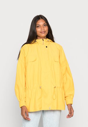 JANICE - Vodotěsná bunda - yellow