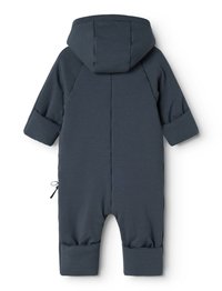Mörkblå enstycksdräkt med huva, som har långa ärmar, elastiska muddar och dragsko i midjan. Texturerat tyg, sömlös design.