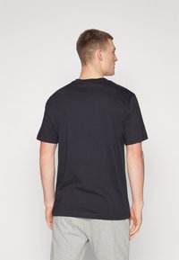 Champion CREWNECK - Camiseta estampada - black