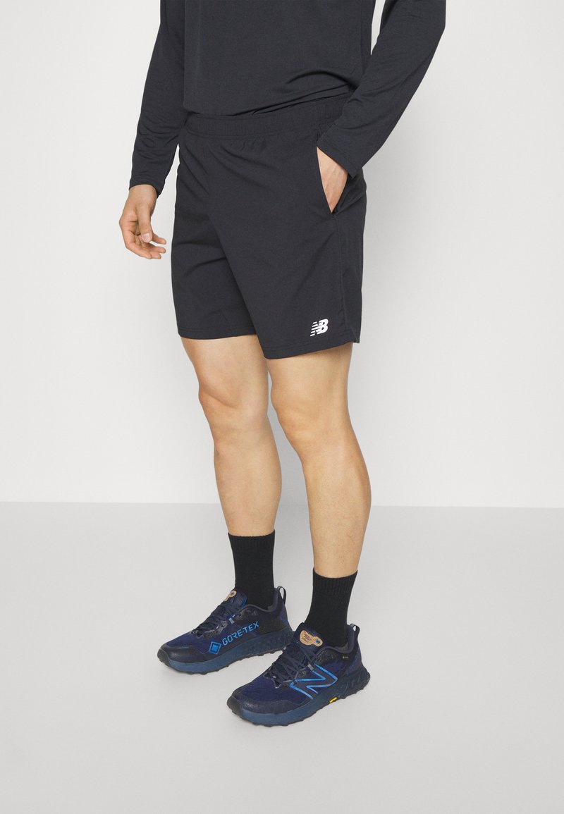 New Balance CORE RUN INCH SHORT Sports shorts black Zalando.ie