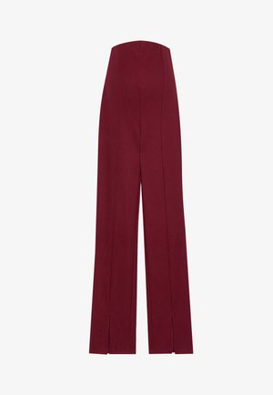 Burgundské široké nohavice s vysokým pásom, s vertikálnym ryhovaním a rozparsekmi na leme pre zvýraznenie dizajnu. Vyrobené z textúrovanej látky.