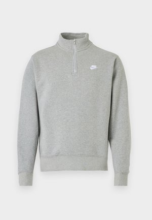 Grå sweatshirt med halvlynlås-krave, lange ærmer, ribbede manchetter og kant. Har et lille hvidt Nike-logo på brystet.