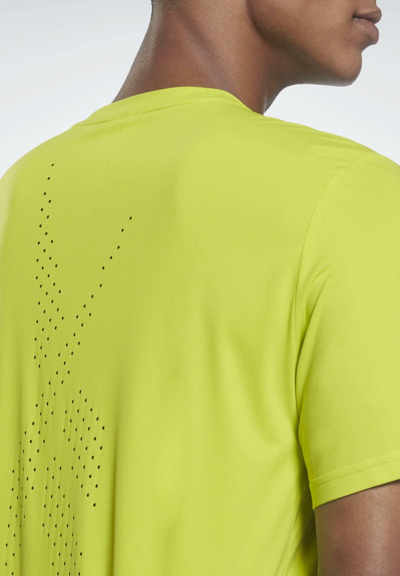 Herren Sportbekleidung | Reebok UNITED BY FITNESS MOVESOFT T-Shirt print yellow/gelb - VL37458 Herren Sportbekleidung | Reebok UNITED BY FITNESS MOVESOFT T-Shirt print yellow/gelb - VL37458
