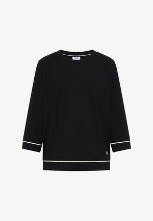 Chemise noire à manches longues avec bordures blanches aux poignets et à l'ourlet, décolleté rond, et petit logo de la marque près du bord inférieur.