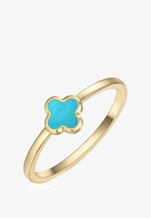 Goldring mit einem dünnen Band und einem kleinen, vierlappigen Türkisstein, der in einer goldenen Fassung in der Mitte eingefasst ist.