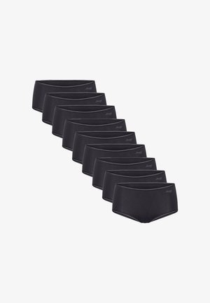 Zehn Paar schwarze nahtlose Damenunterhosen mit Sloggi-Logo am Bund, in einer versetzten diagonalen Reihe angeordnet.