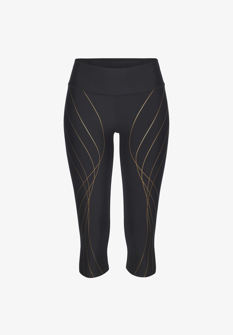 Schwarze Capri-Leggings mit hohem Bund, ausgestattet mit goldenen gewellten Linien als Muster. Hergestellt aus dehnbarem Stoff für Komfort und Bewegungsfreiheit.