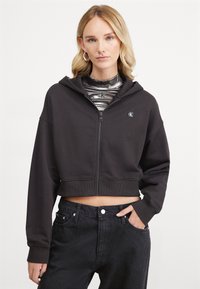 Calvin Klein Jeans - EMBRO BADGE ZIP THROUGH - Sweater met rits - black Miniatuurafbeelding 1