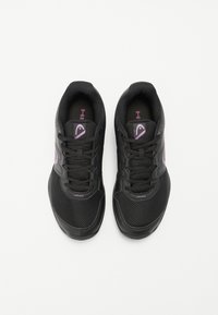 Black athletic shoes with mesh and synthetic materials, featuring purple accents and laces, designed for comfort and flexibility.
