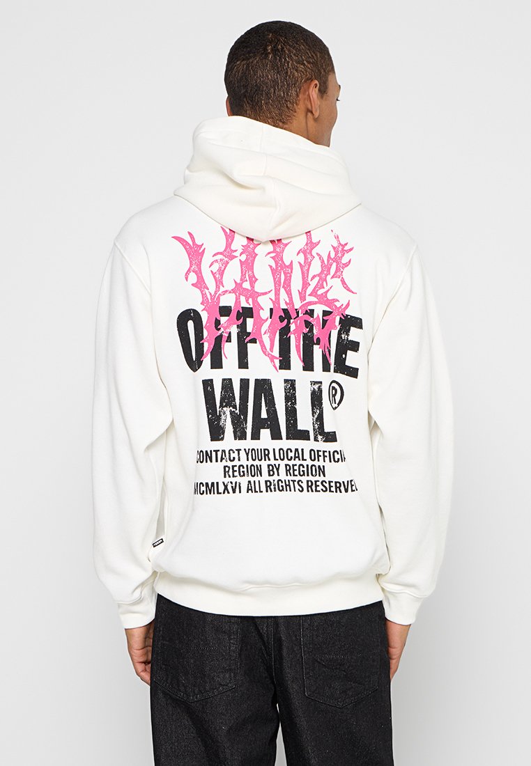Biała bluza z kapturem z różowymi i czarnymi grafikami na plecach. Posiada luźny krój, przednią kieszeń typu kangurka oraz ściągacze na mankietach.