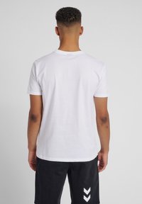 Hummel HMLGO - T-shirt print - white